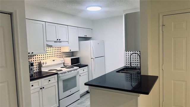 709 SECRET HARBOR LANE 111, Lake Mary, FL 32746