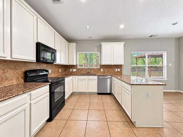 43 W Spindle Tree Circle, The Woodlands, TX 77382