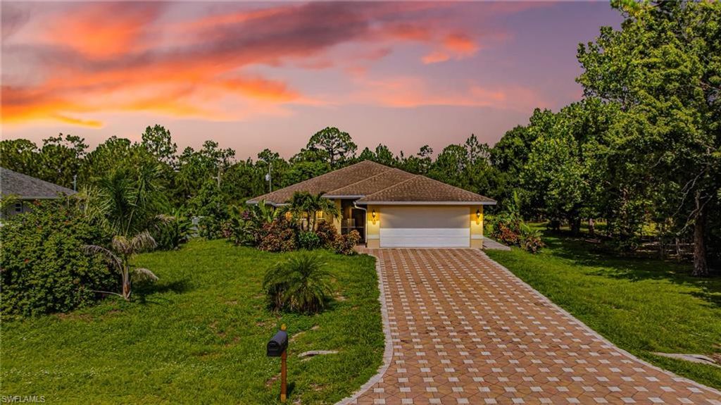 1407 Poinsettia AVE, LEHIGH ACRES, FL 33972 — exterior