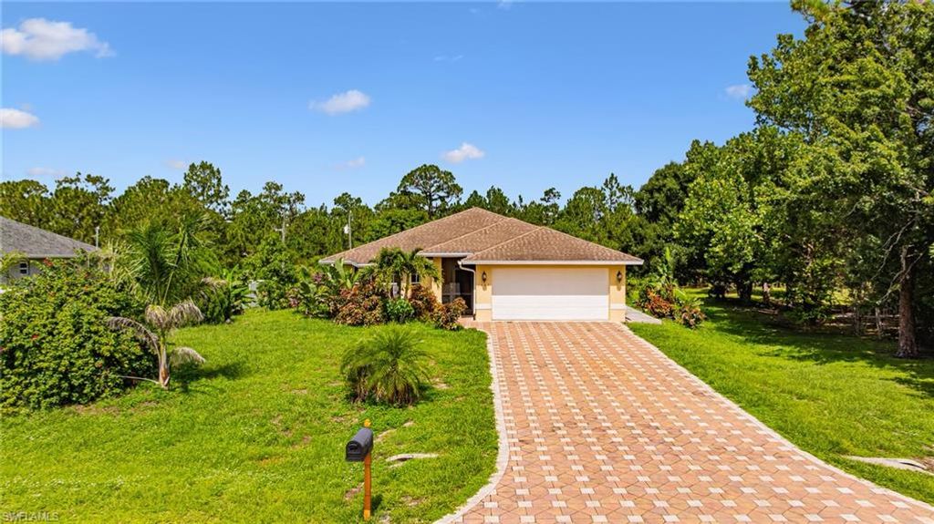 1407 Poinsettia AVE, LEHIGH ACRES, FL 33972 — photo 2