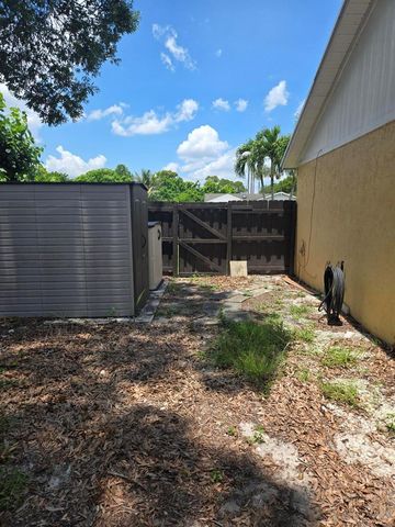 1402 Denlow Lane, Royal Palm Beach, FL 33411