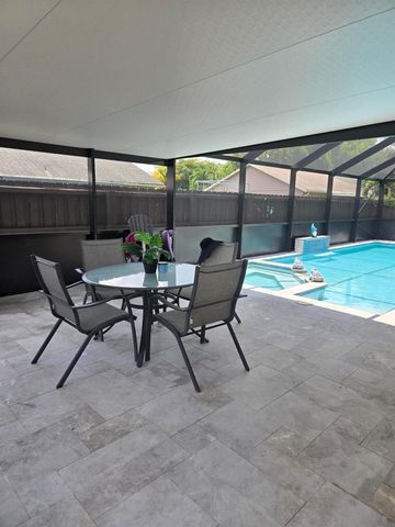 1402 Denlow Lane, Royal Palm Beach, FL 33411