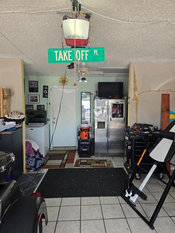 1402 Denlow Lane, Royal Palm Beach, FL 33411