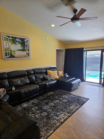 1402 Denlow Lane, Royal Palm Beach, FL 33411