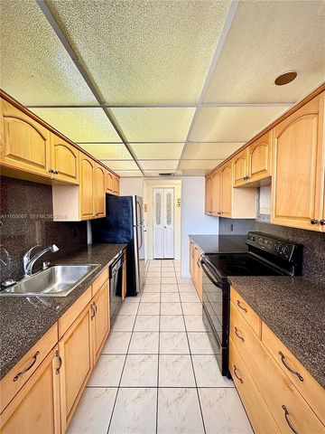 1100 Saint Charles Place 411, Pembroke Pines, FL 33026