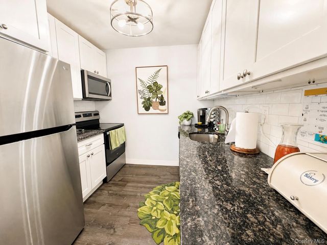275 Berwick Court A, Ridge, NY 11961