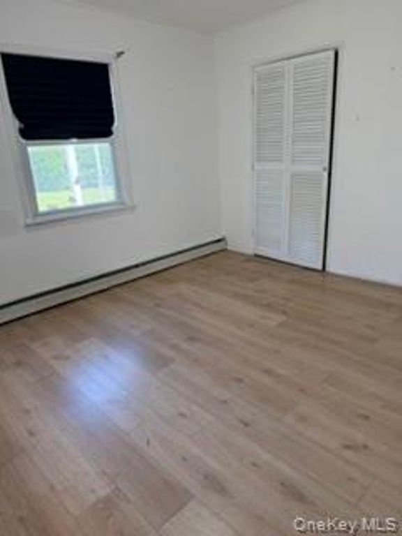 671 Lowell Street, Westbury, NY 11590 — photo 2