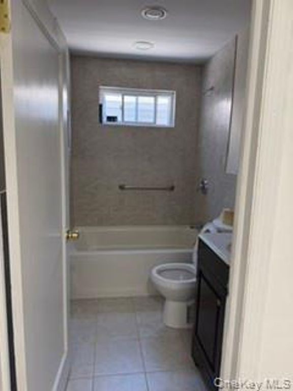 671 Lowell Street, Westbury, NY 11590 — photo 4