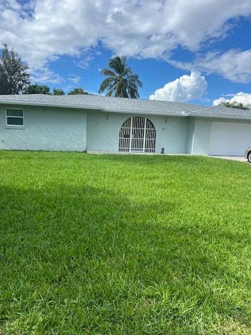 153 Meadowlark Drive, Royal Palm Beach, FL 33411