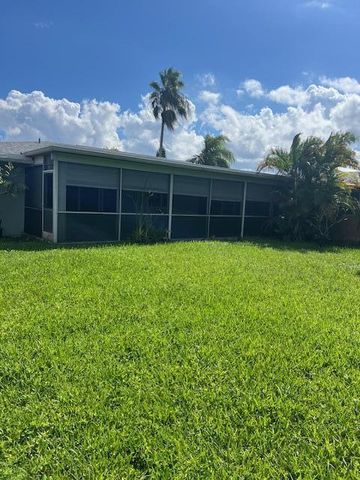153 Meadowlark Drive, Royal Palm Beach, FL 33411