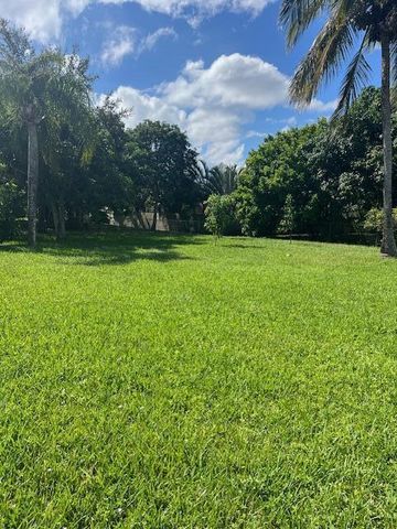 153 Meadowlark Drive, Royal Palm Beach, FL 33411