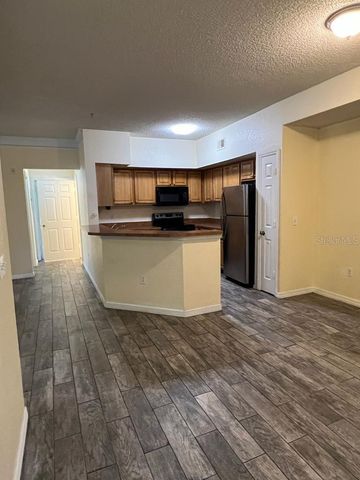 13025 MULBERRY PARK DRIVE 311, Orlando, FL 32821