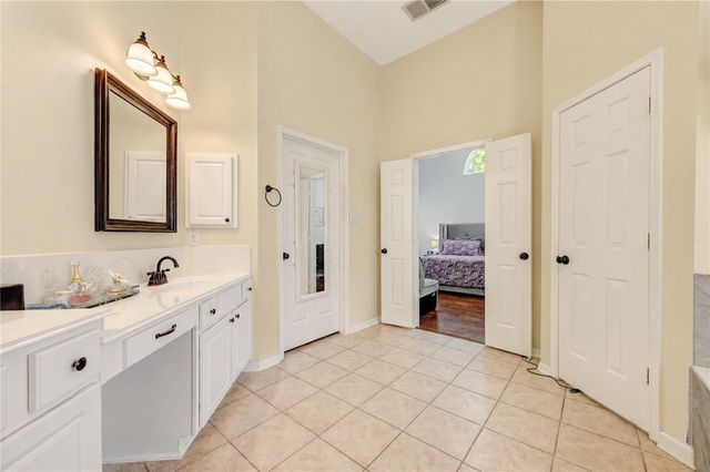 11 Ryanwyck Place, The Woodlands, TX 77384