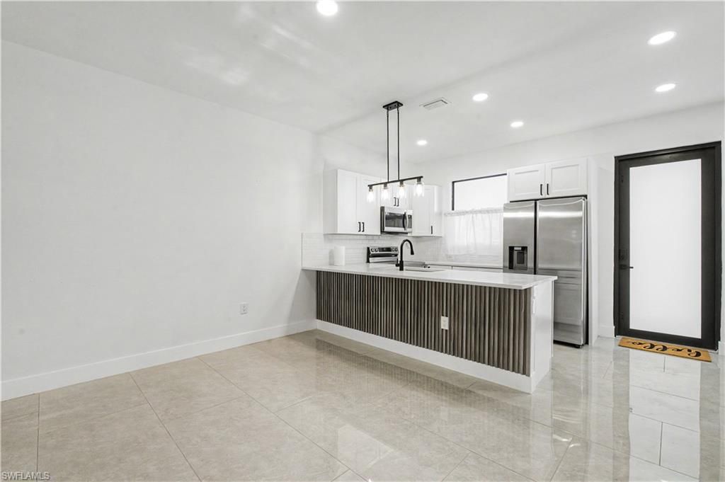873 Eisenhower BLVD, LEHIGH ACRES, FL 33974 — photo 4