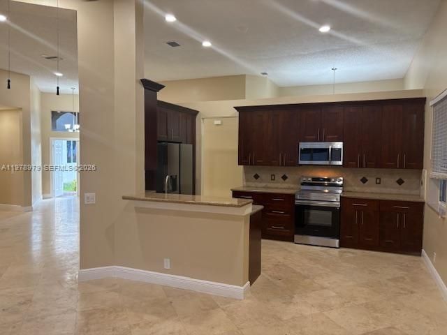 1290 Camellia Ln, Weston, FL 33326