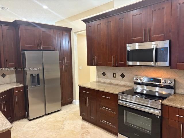 1290 Camellia Ln, Weston, FL 33326