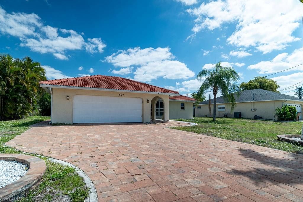 Image 1 of property listing at 3725 8th PL, Cape Coral, FL 33904