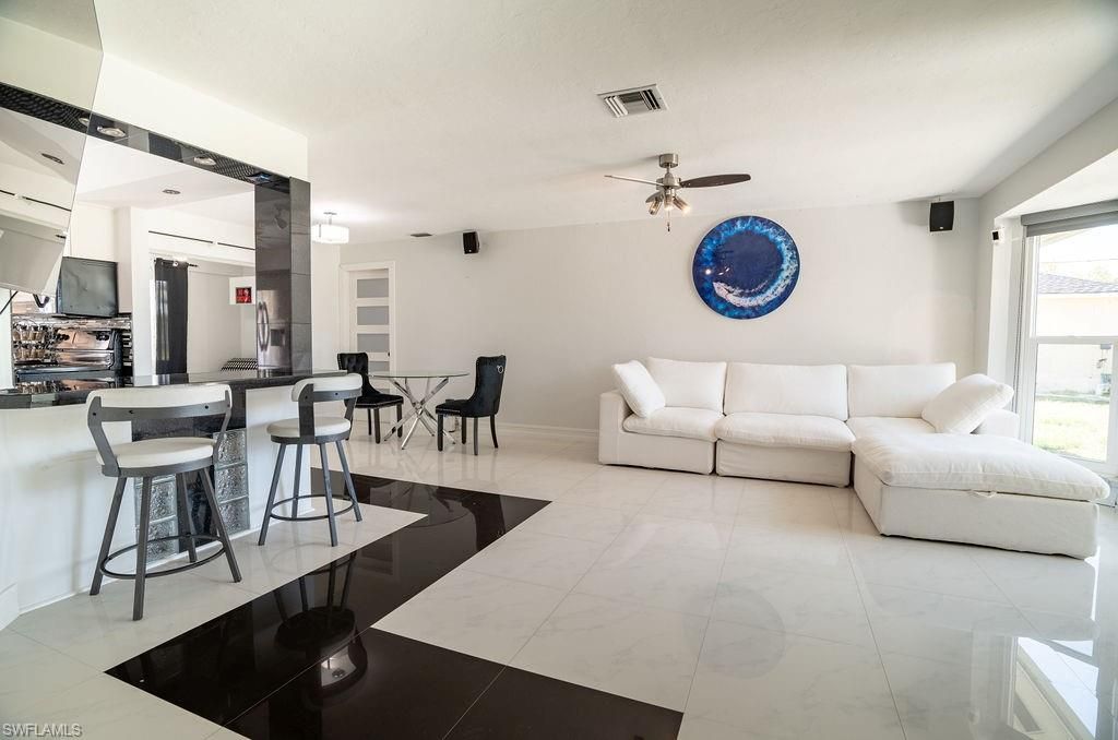 Image 5 of property listing at 3725 8th PL, Cape Coral, FL 33904