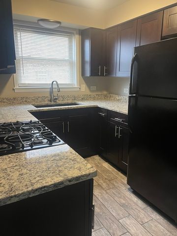 8139 W 83rd Place 1E, Justice, IL 60458