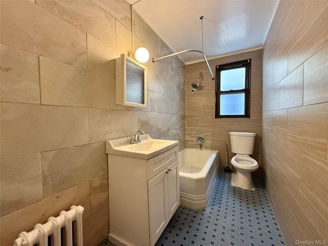 5718 79th Avenue, Glendale, NY 11385
