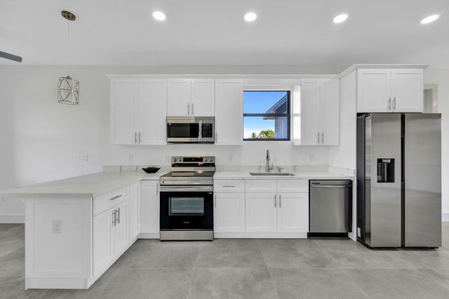 312 Progress Avenue, Lehigh Acres, FL 33974