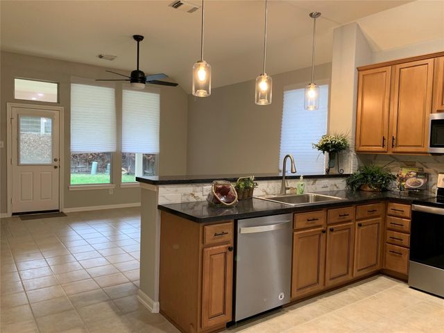46 Patina Pines Court, The Woodlands, TX 77381
