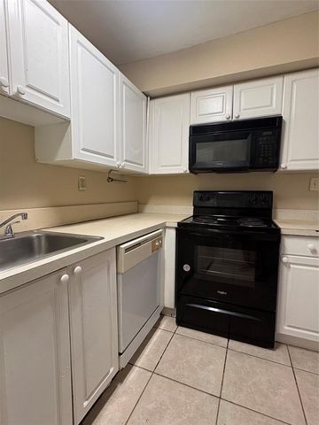 203 POINSETTIA PINE COURT 102, Tampa, FL 33612