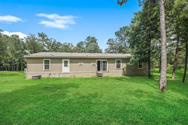 577 Winding River Road, Oakhurst, TX 77364