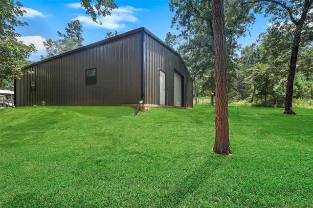 577 Winding River Road, Oakhurst, TX 77364
