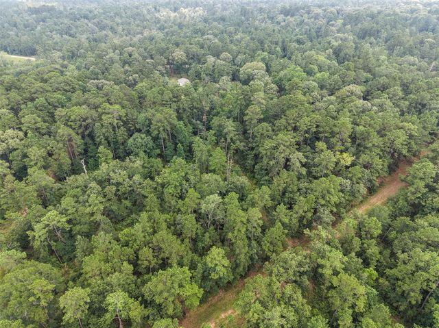 577 Winding River Road, Oakhurst, TX 77364