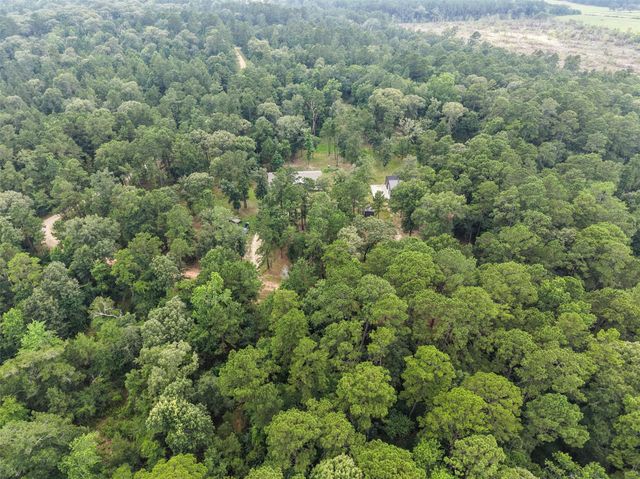 577 Winding River Road, Oakhurst, TX 77364