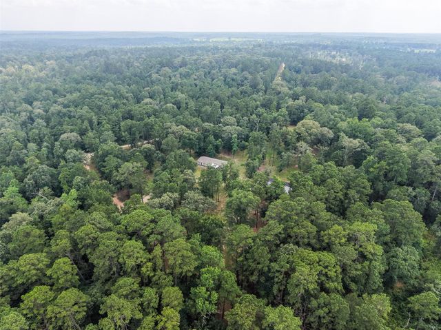 577 Winding River Road, Oakhurst, TX 77364
