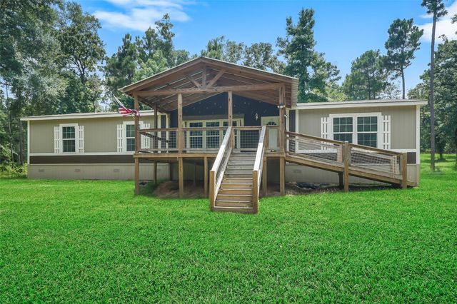 577 Winding River Road, Oakhurst, TX 77364