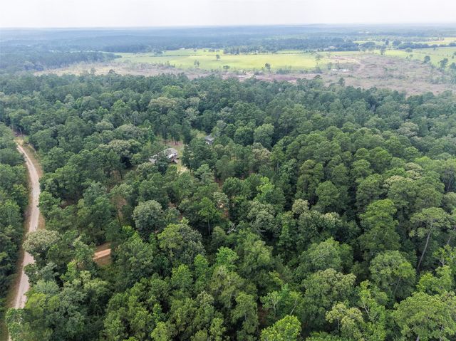 577 Winding River Road, Oakhurst, TX 77364