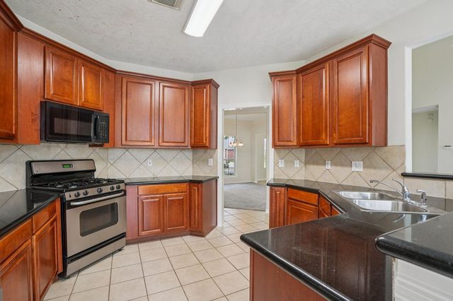 7803 Deerwood Lake Drive, Humble, TX 77346