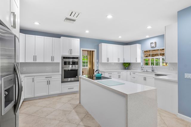 110 Glenbrook Court, Atlantis, FL 33462