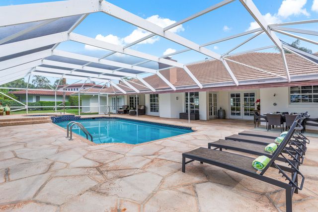 110 Glenbrook Court, Atlantis, FL 33462