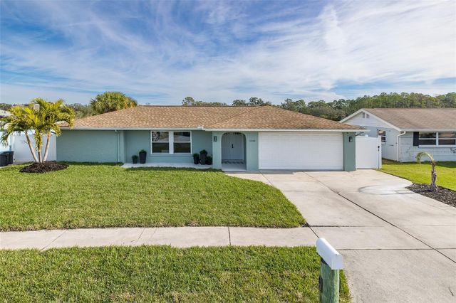 1166 CHANCELLOR DRIVE, Holiday, FL 34690