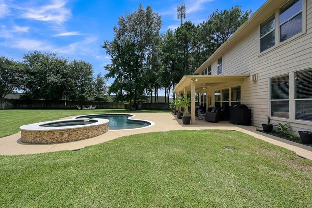 30902 Oak Forest Hollow Lane, Spring, TX 77386