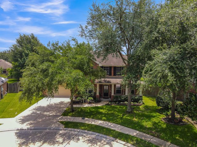 30902 Oak Forest Hollow Lane, Spring, TX 77386