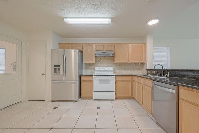 9138 Blake Bend Circle, Houston, TX 77095