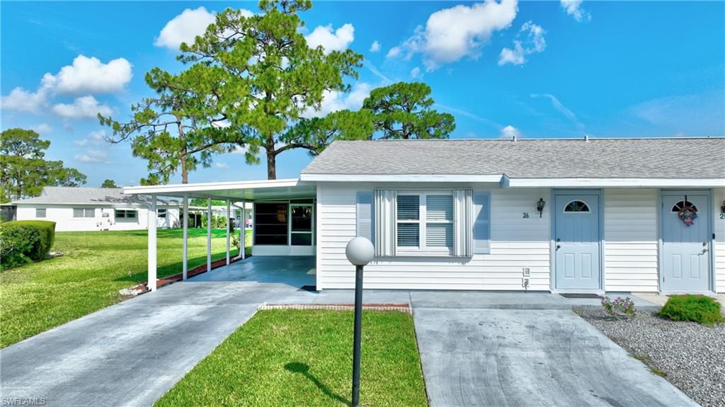 26 Pinewood BLVD, LEHIGH ACRES, FL 33936 — exterior