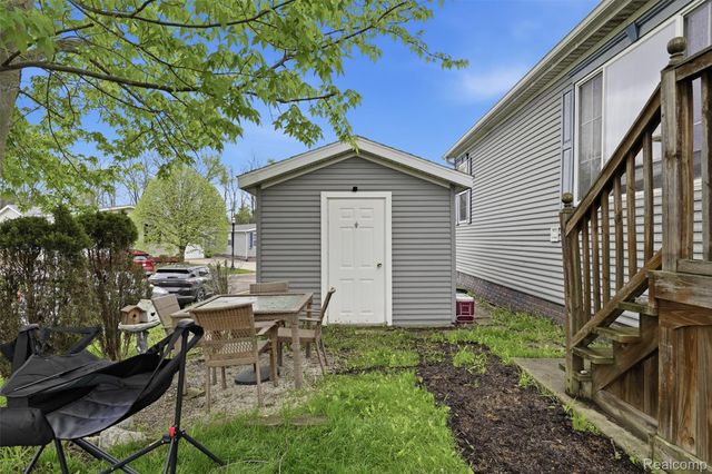11105 Wood Run Circle, Green Oak Township, MI 48178