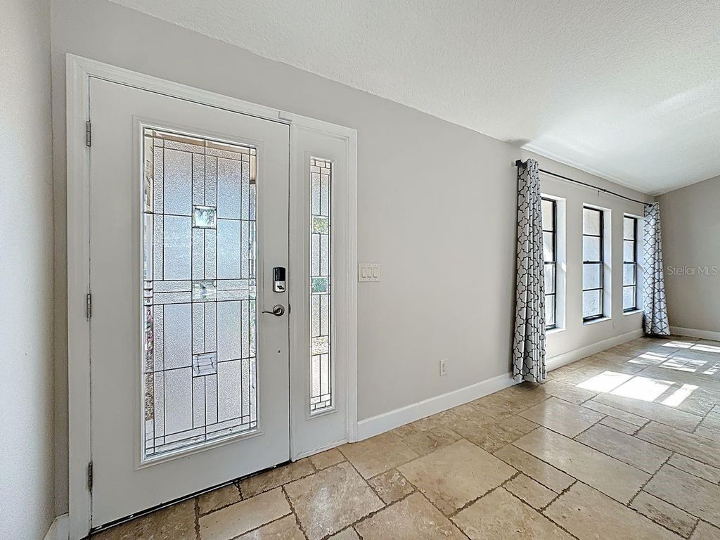 Image 5 of property listing at 8019 N MADEIRA COURT, Orlando, FL 32836