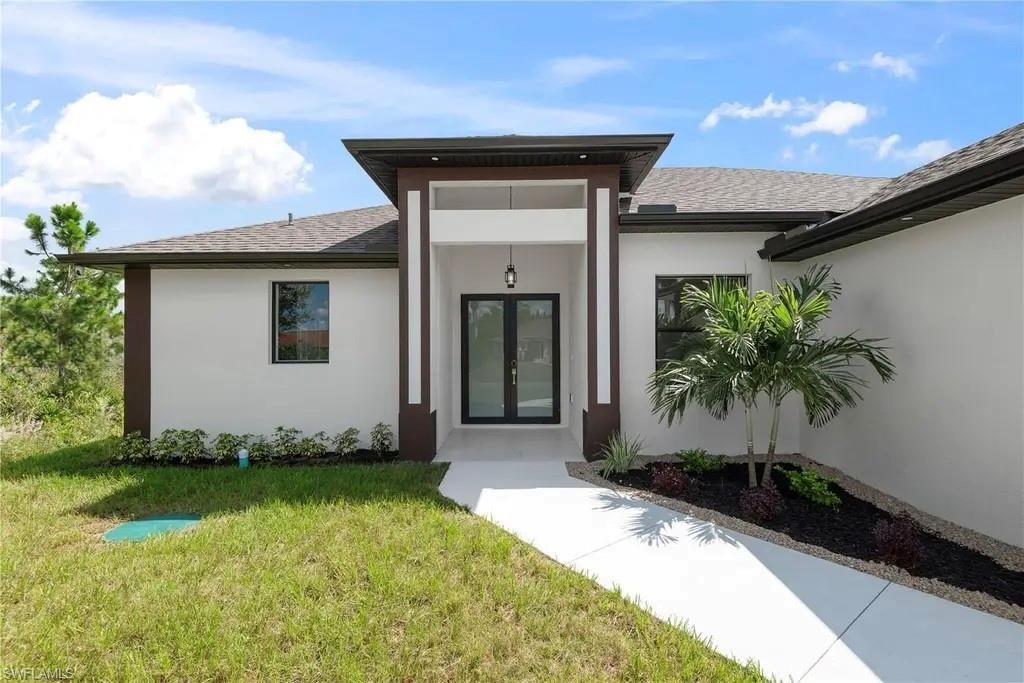 218 Irving AVE, LEHIGH ACRES, FL 33936 — exterior