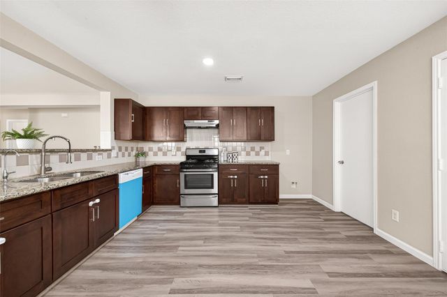 13126 Dawn Hollow Lane, Houston, TX 77072