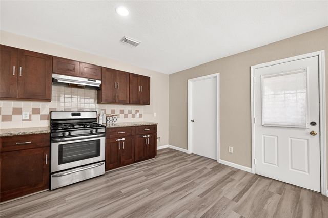 13126 Dawn Hollow Lane, Houston, TX 77072