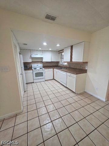202 Eaglesmere DR, Lehigh Acres, FL 33936