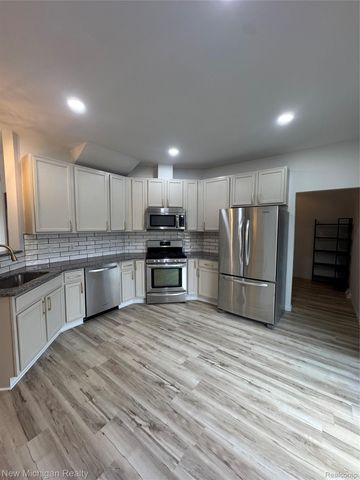 3065 Wild Orchid Lane, Burton, MI 48519