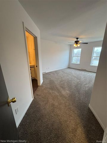 3065 Wild Orchid Lane, Burton, MI 48519